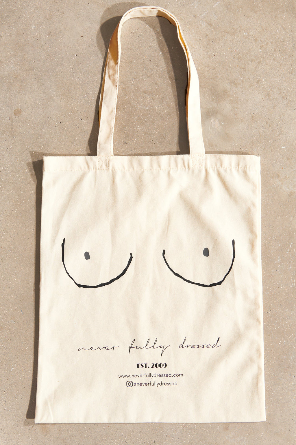 NEVER FULLY DRESSED Boob Bag