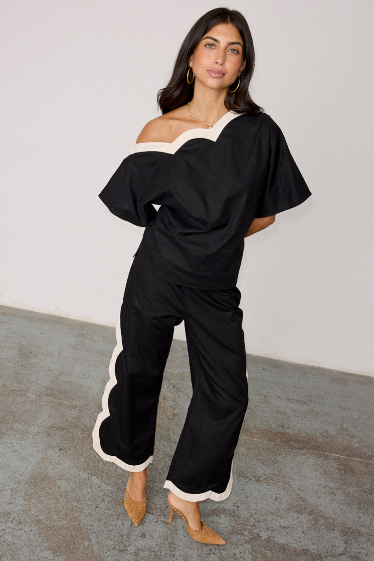 NEVER FULLY DRESSED Mono Scallop Trousers