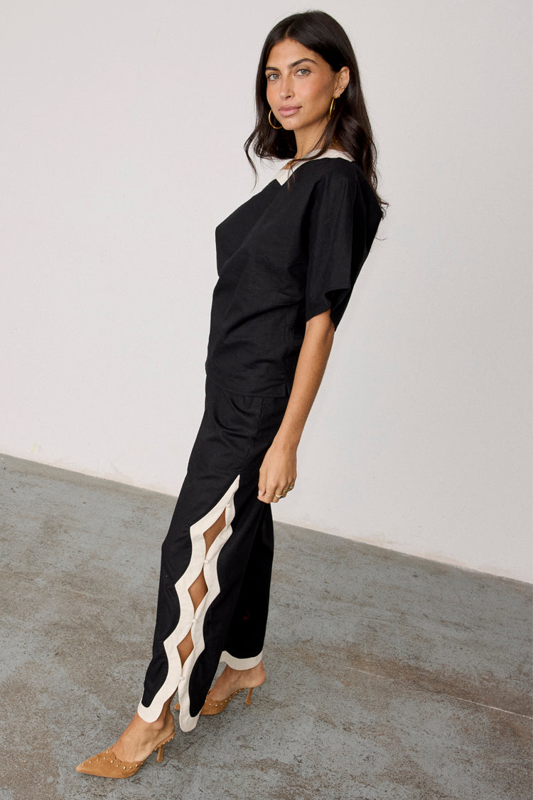 NEVER FULLY DRESSED Mono Scallop Trousers