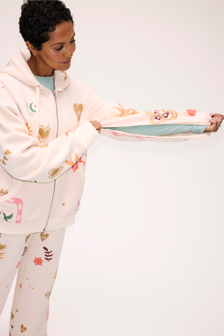 NEVER FULLY DRESSED Cream Sundazed Accessible Hoodie